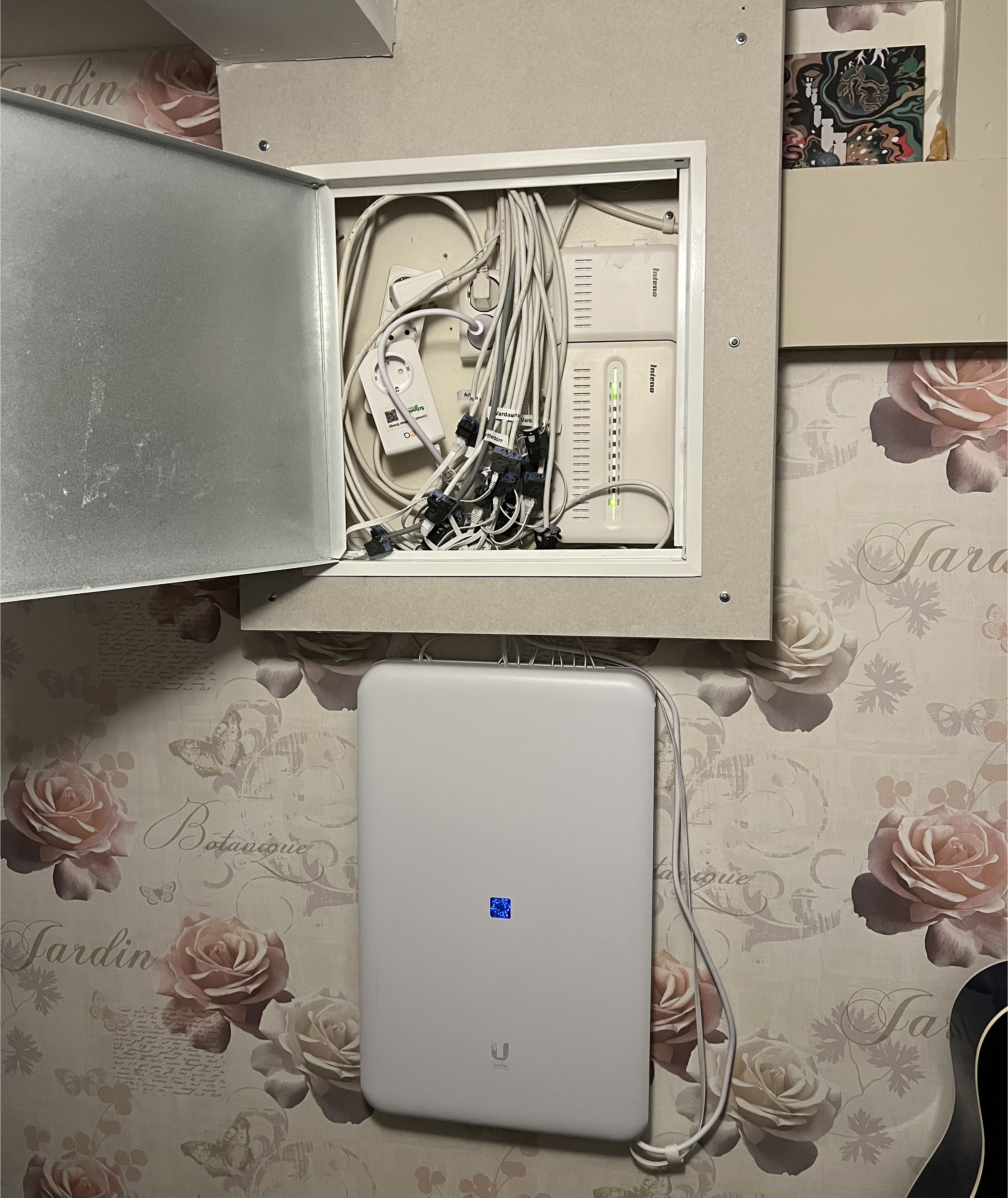 Unify Dream Wall beneath cable box mounted on wall